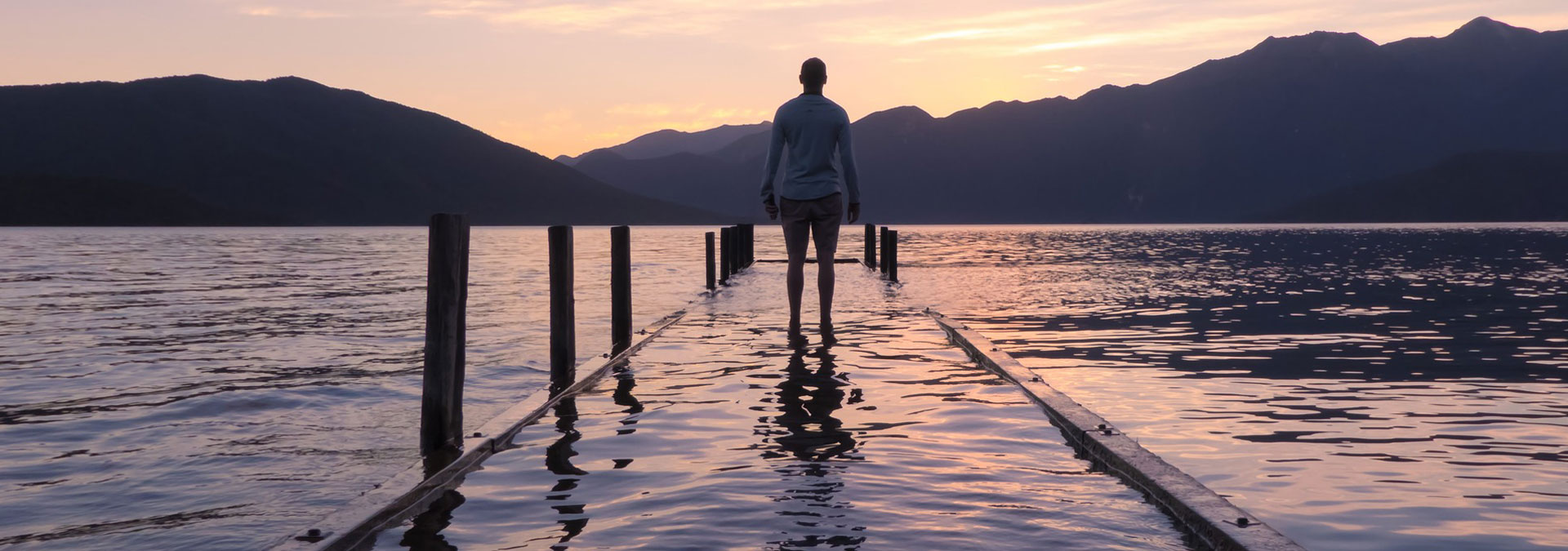 Higgaion.net header pic - person standing on dock